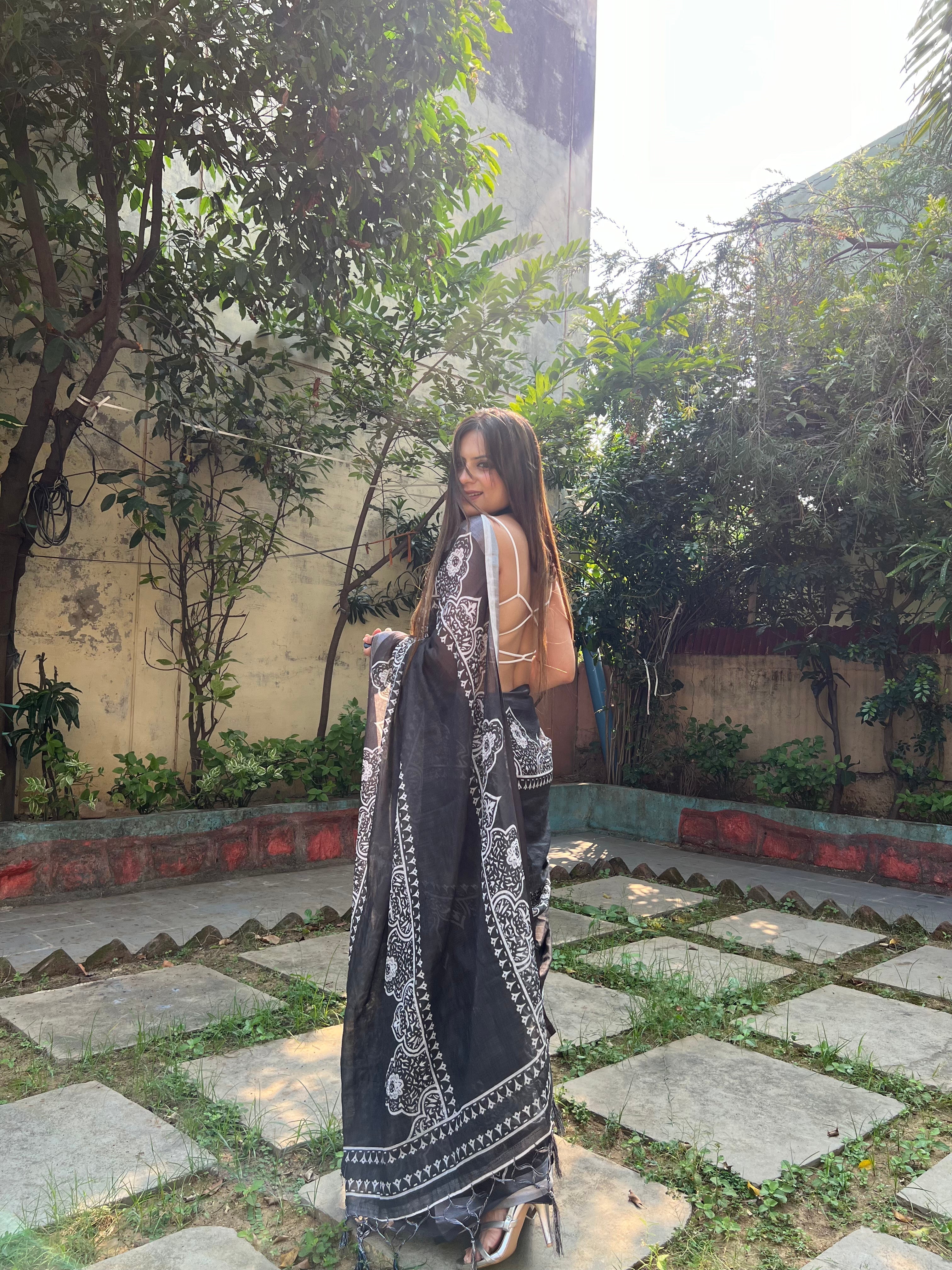 Black and White Pure Cotton Linen Saree with Intricate Floral Design and Tassels on Edges