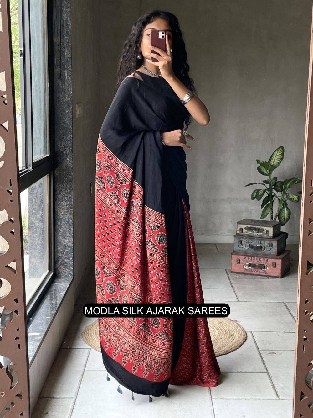 Ajrakh Printed Saree Black & Red Modal Silk with Heritage Border, Traditional Pallu & Tassel Detailing