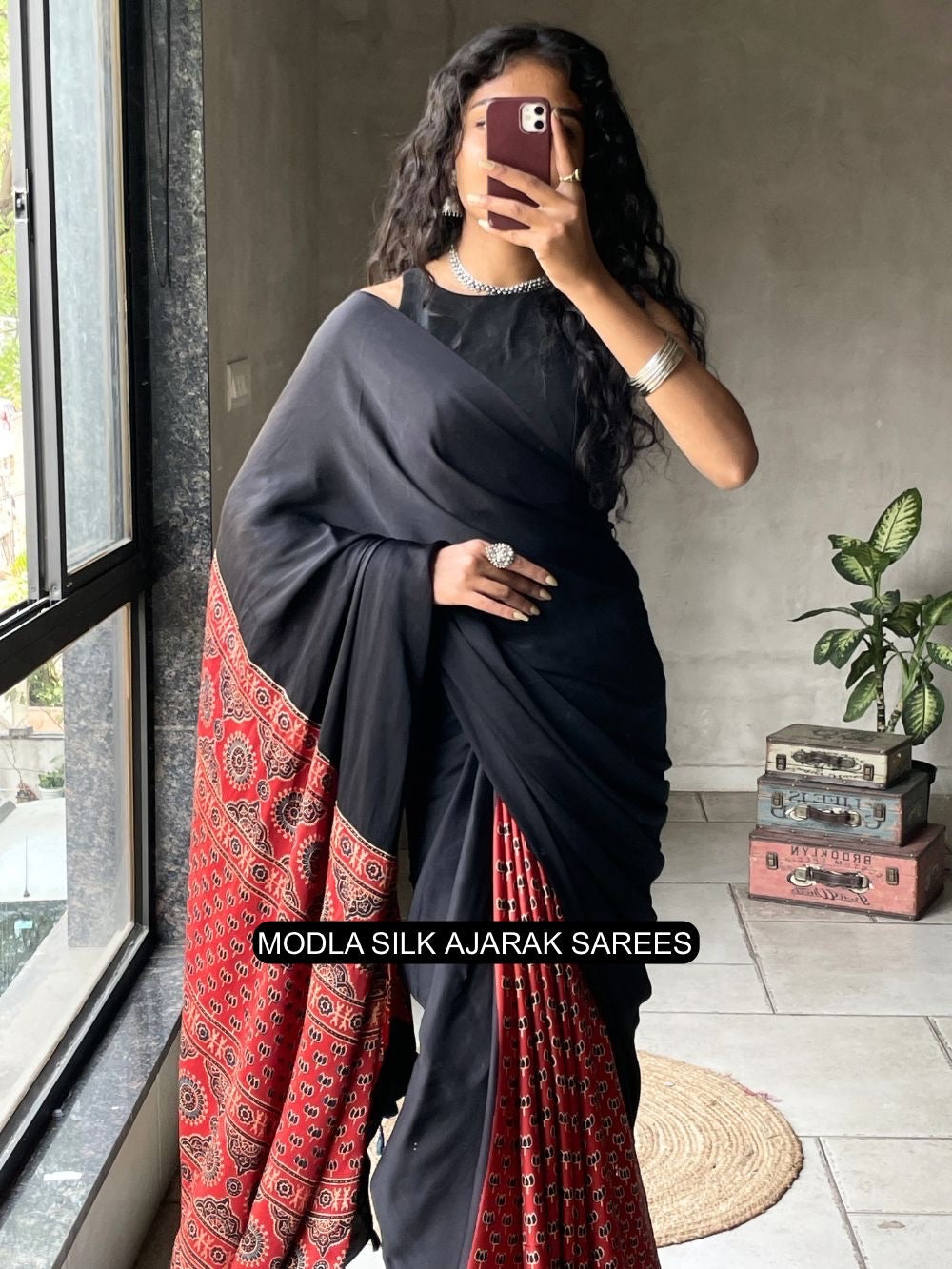 Ajrakh Printed Saree Black & Red Modal Silk with Heritage Border, Traditional Pallu & Tassel Detailing