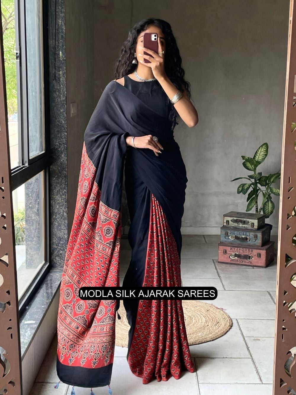 Ajrakh Printed Saree Black & Red Modal Silk with Heritage Border, Traditional Pallu & Tassel Detailing