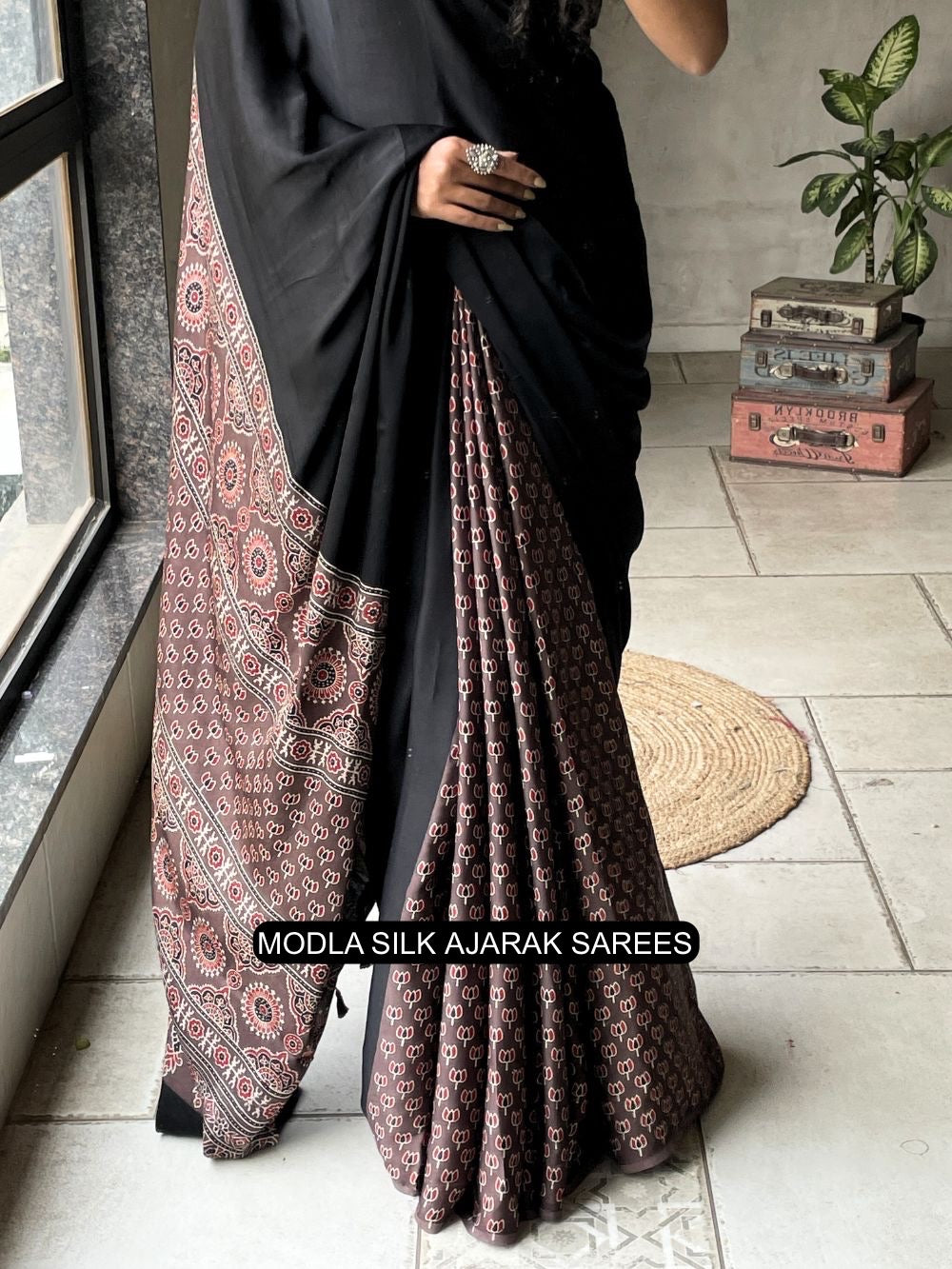 Ajrakh Printed Saree Black Modal Silk with Traditional Heritage Pallu, Intricate Ethnic Motifs & Tassel Detailing