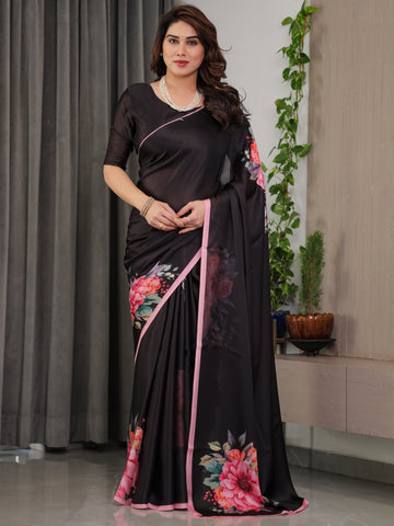 Black Satin Georgette Floral Printed Saree with Soft Pink Border & Attached Blouse – Elegant Designer Partywear Drape