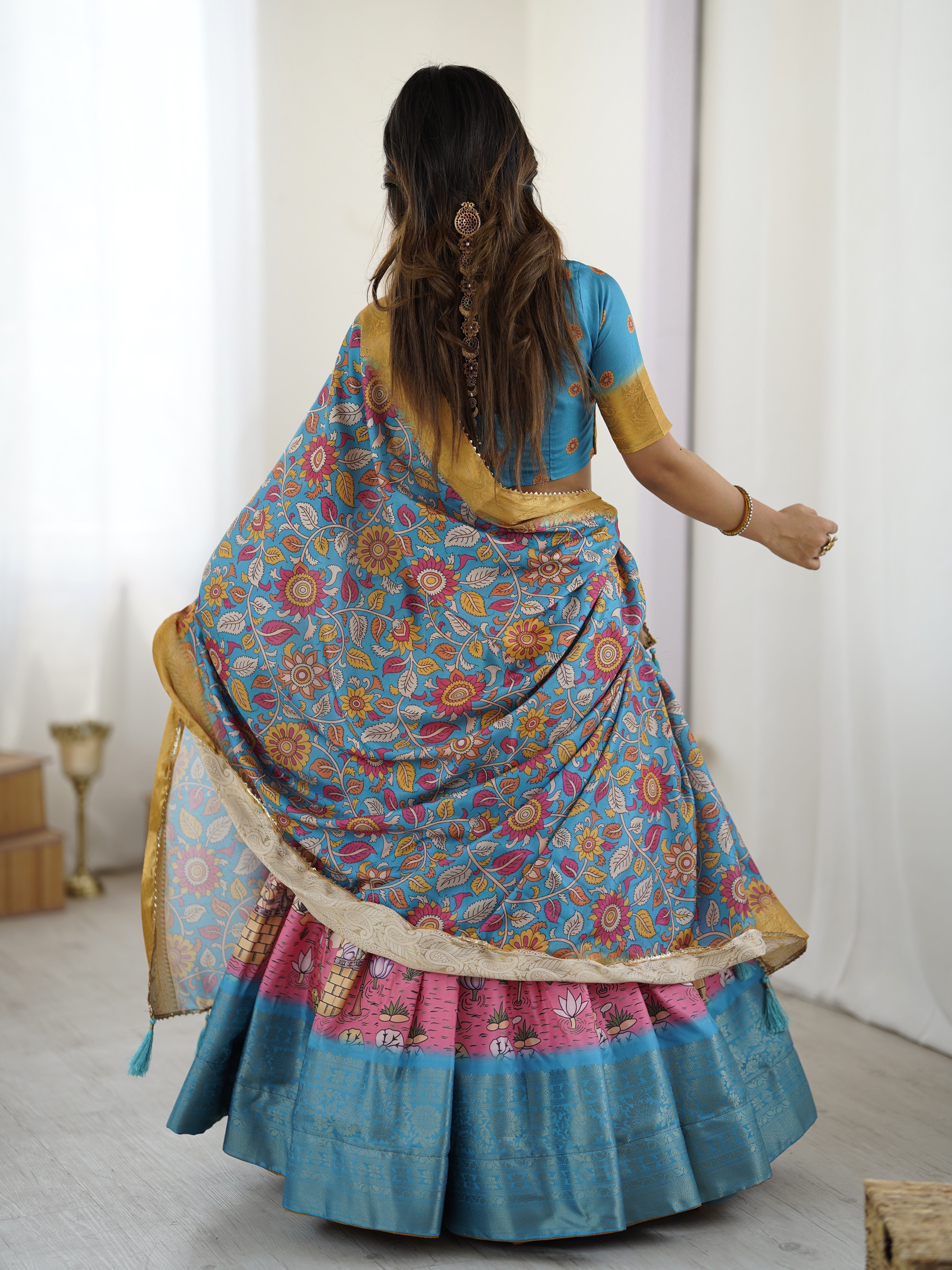 Elegant Kalamkari Lehenga in Blue and Peach with Floral Dupatta and Flared Skirt
