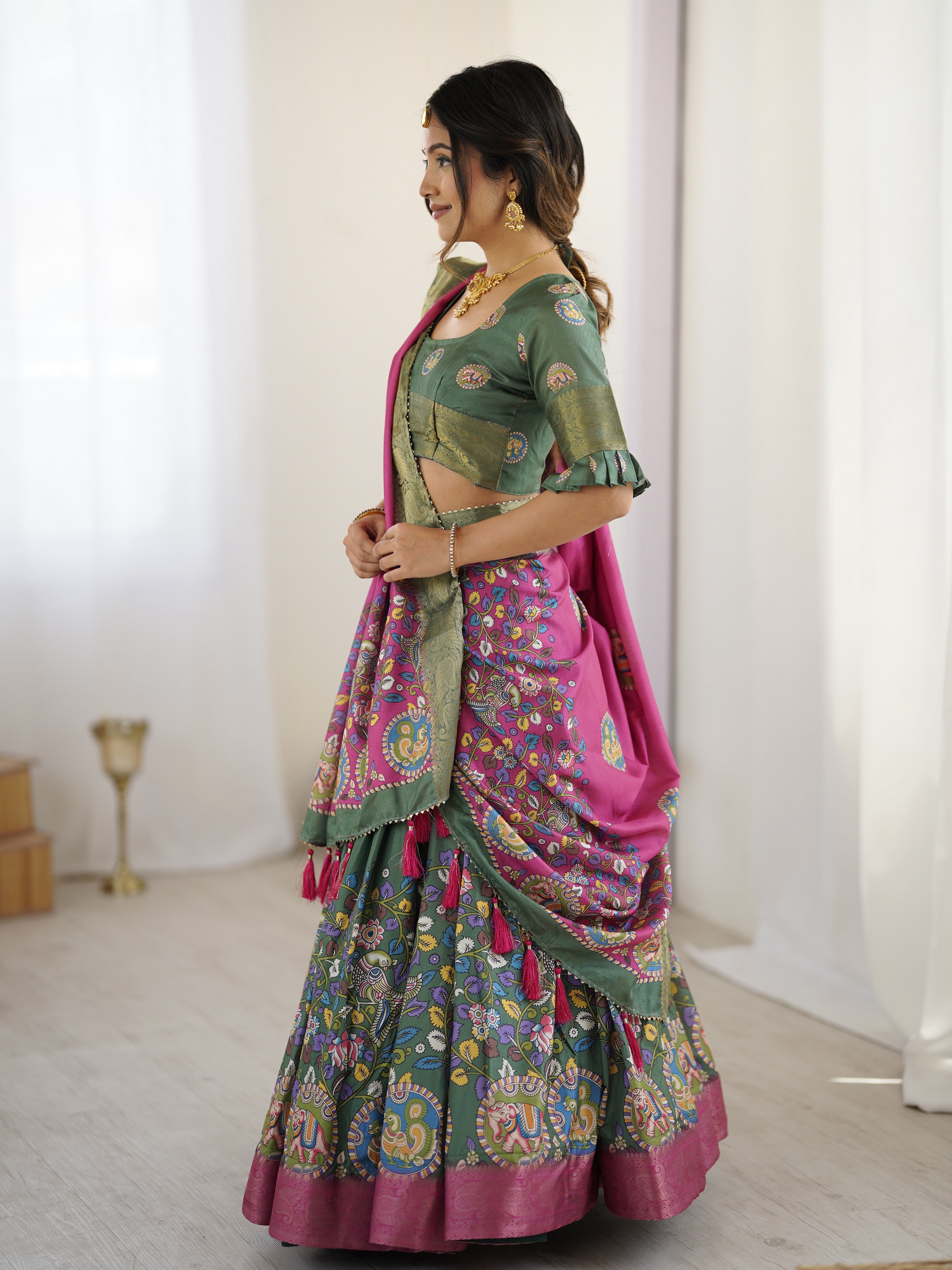 Green & Pink Kalamkari Tussar Silk Lehenga with Zari Border & Tassel Dupatta – Festive & Wedding Wear