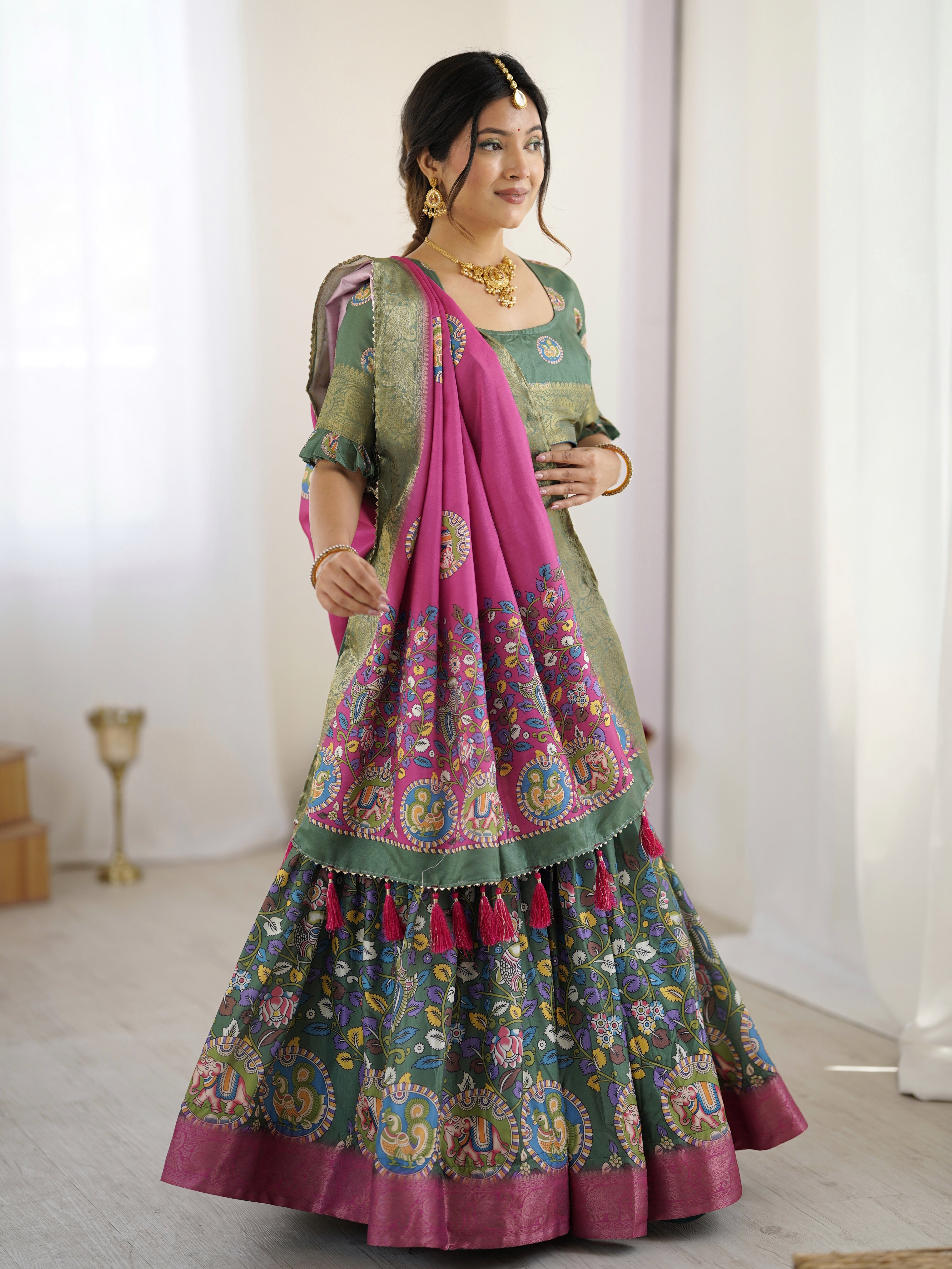 Green & Pink Kalamkari Tussar Silk Lehenga with Zari Border & Tassel Dupatta – Festive & Wedding Wear