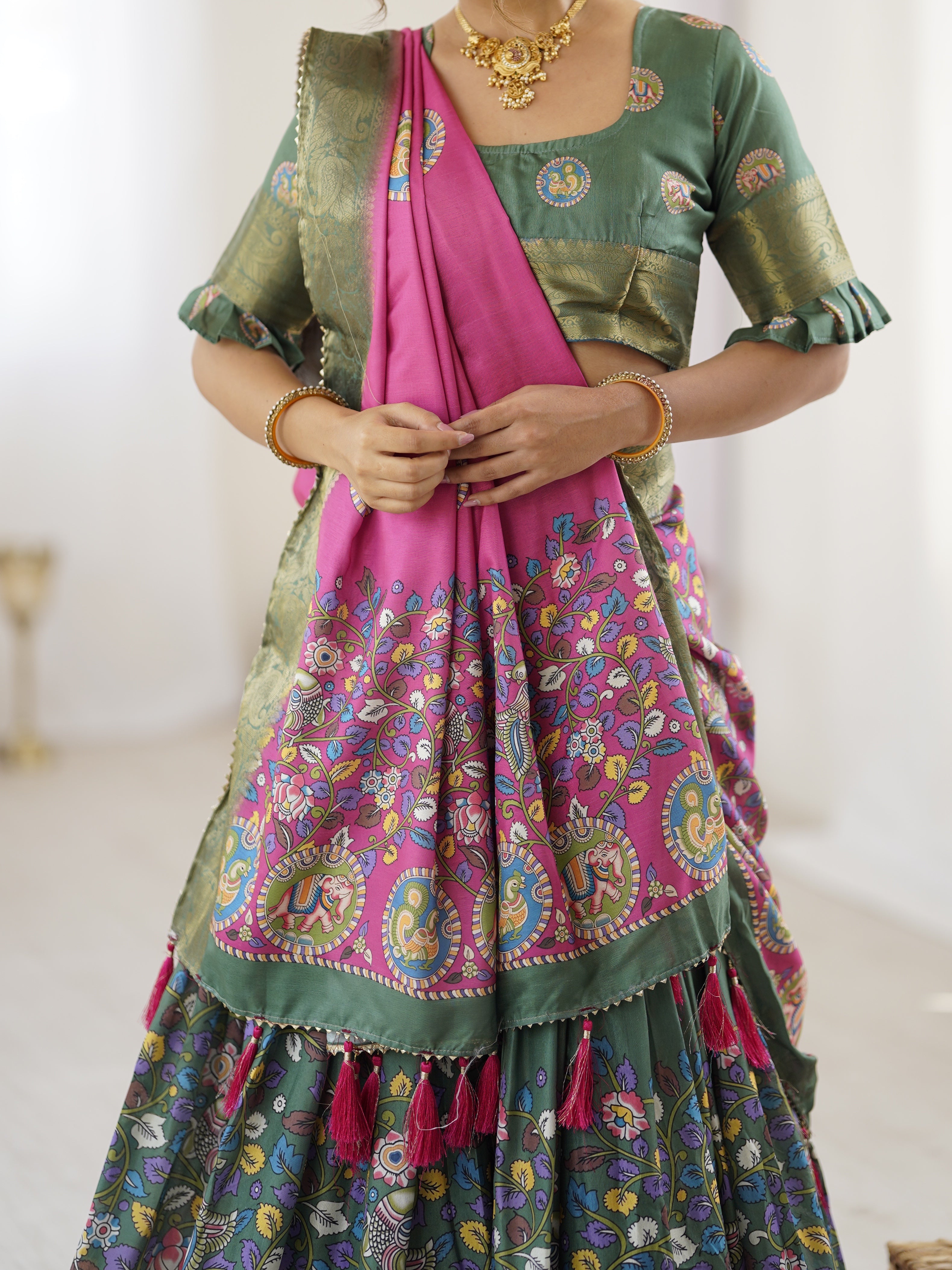 Green & Pink Kalamkari Tussar Silk Lehenga with Zari Border & Tassel Dupatta – Festive & Wedding Wear