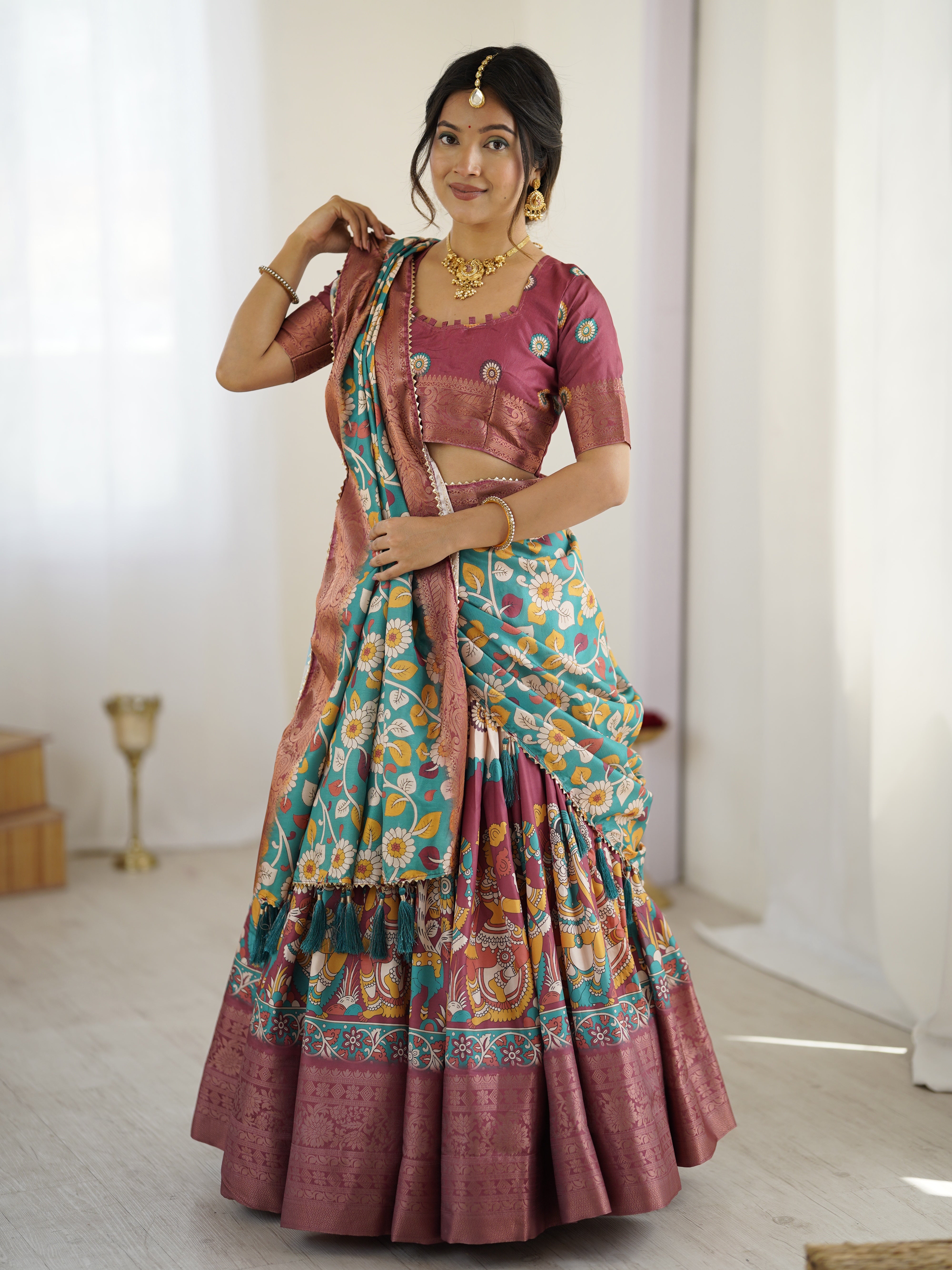 Wine & Turquoise Kalamkari Tussar Silk Lehenga with Floral Motifs, Zari Border & Tassel Dupatta – Wedding & Festive Wear