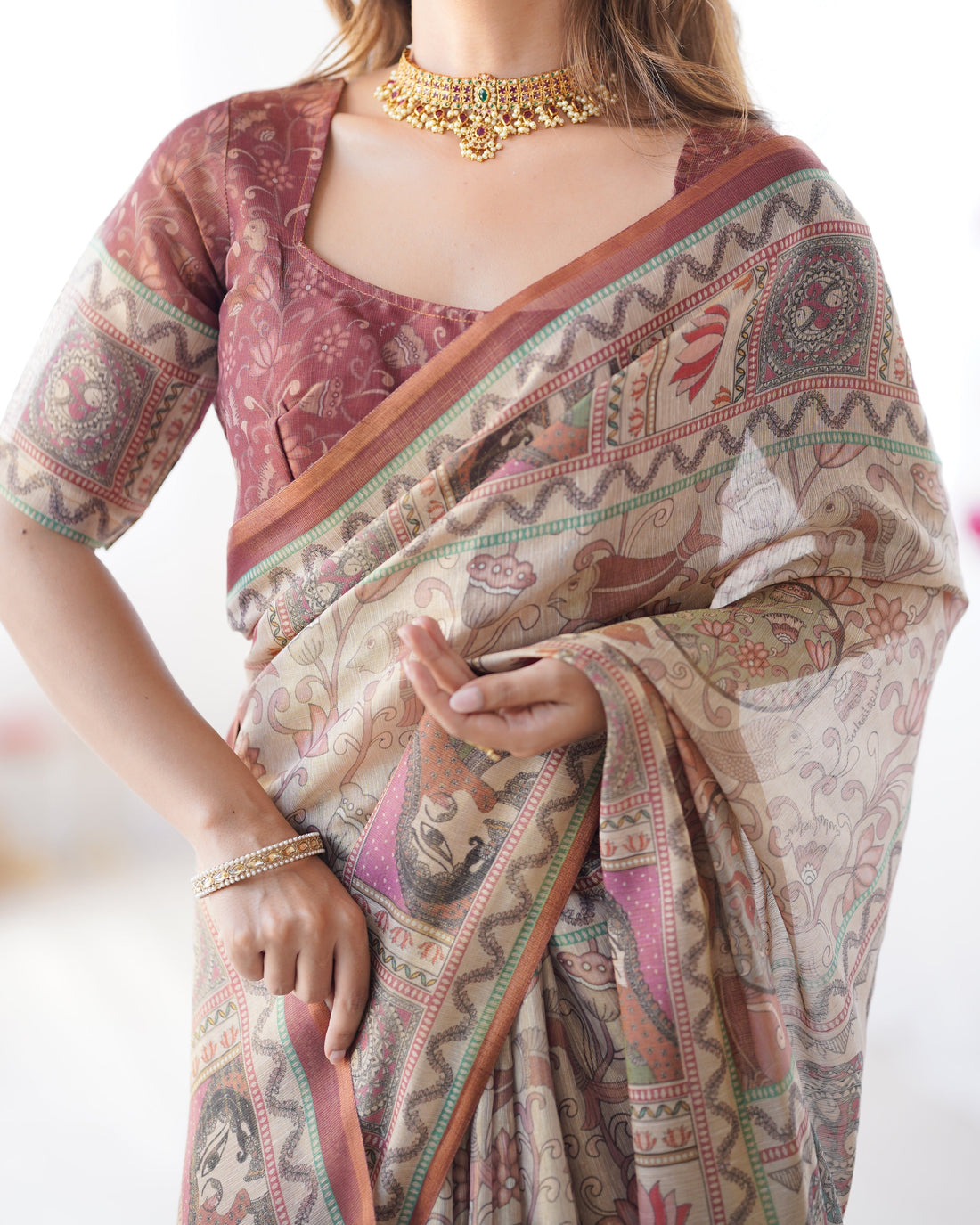 Beige & Maroon Handloom Cotton Saree with Royal Faces & Elephant Pallu Motif