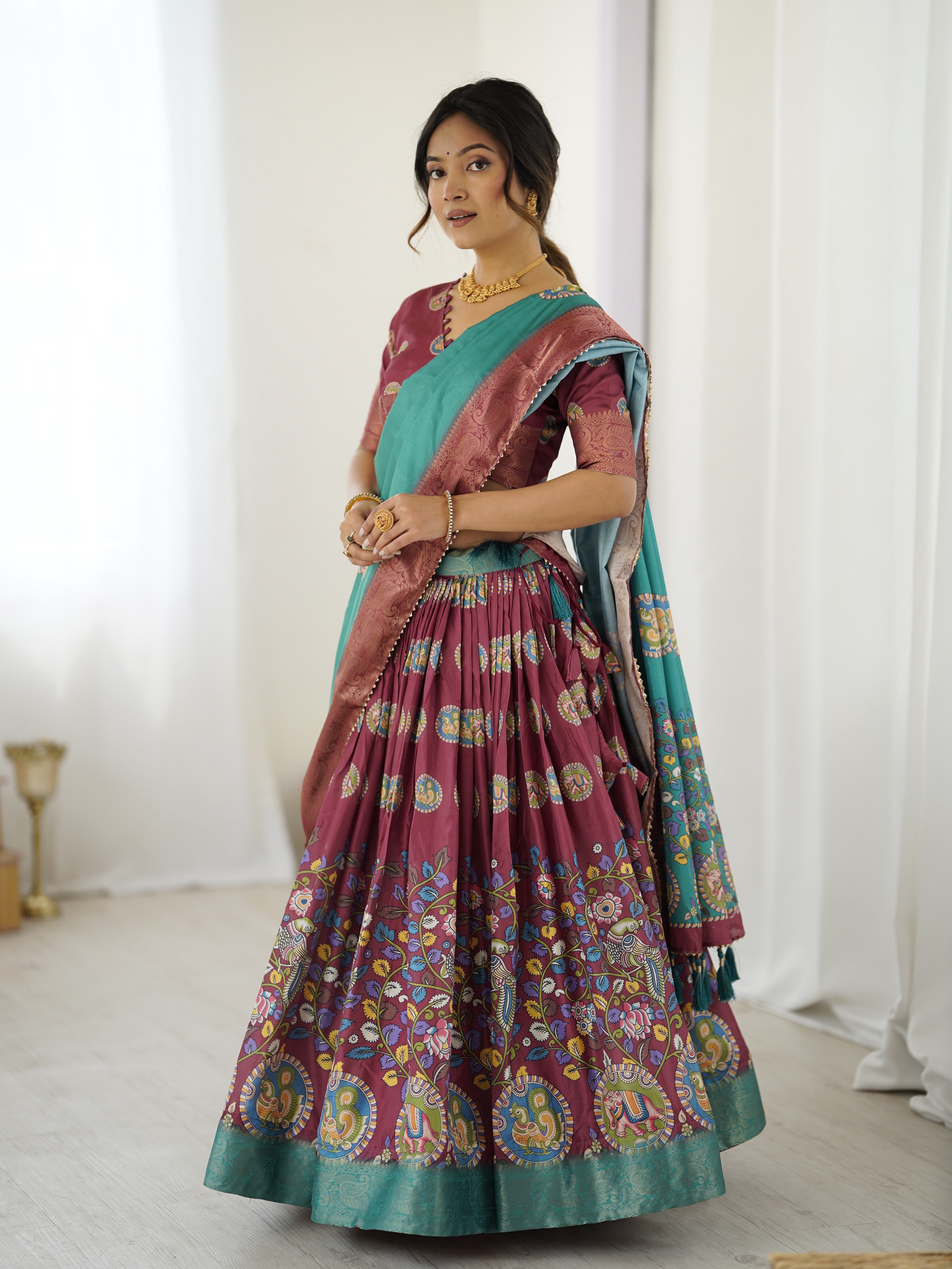Wine & Teal Kalamkari Tussar Silk Lehenga with Zari Border & Tassel Dupatta – Festive & Wedding Wear