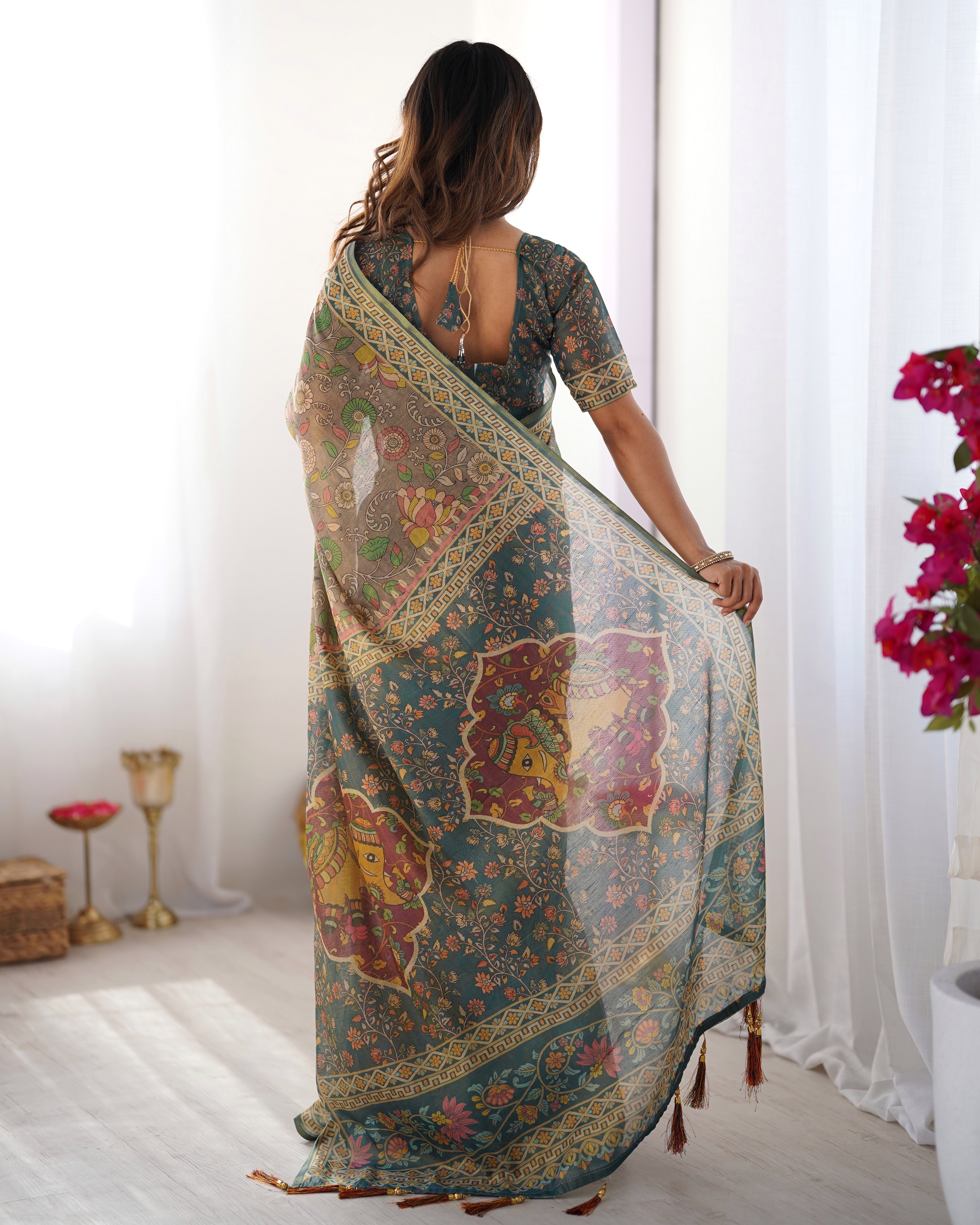 Teal Green Handloom Cotton Saree with Floral Print and Royal Elephant Pallu