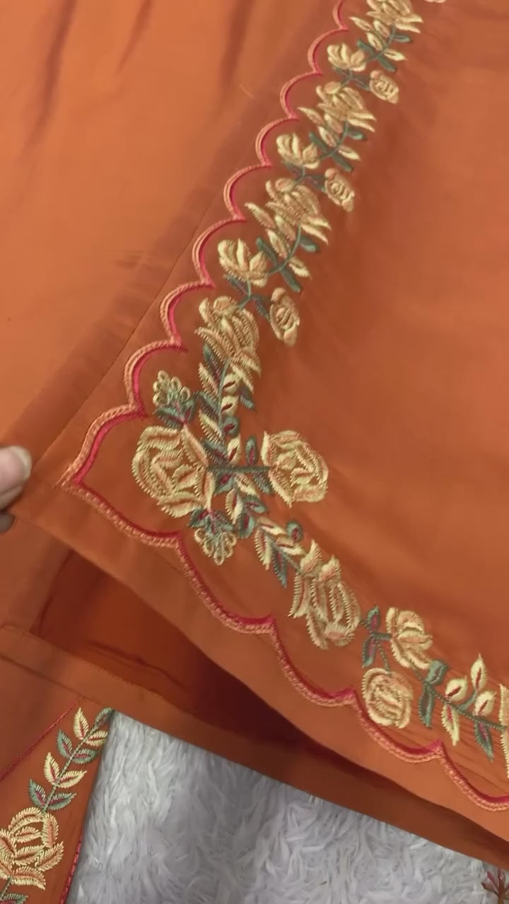 Rust Orange Three-Piece Ethnic Suit Set with Intricate Neckline Embroidery